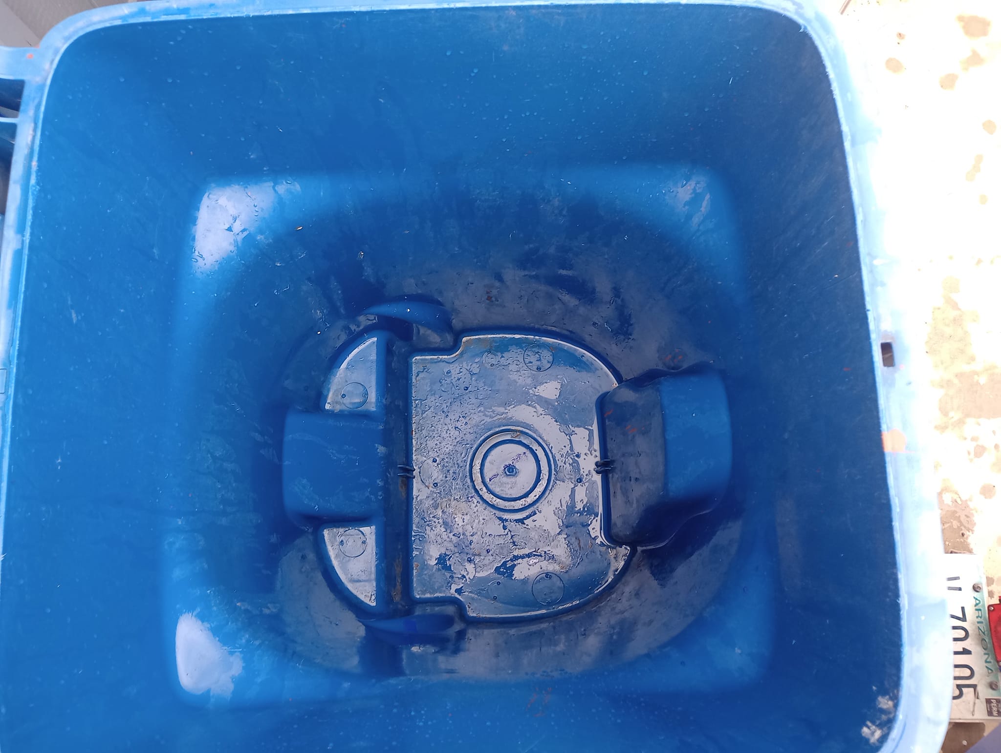 A clean bin after servicing by STORM trash bin cleaning services based in Bullhead City AZ The bin is visibly clean and has been sanitized using hot pressured water in a custom setup in Ft Mohave AZ 
